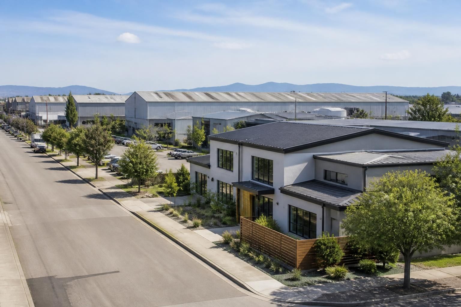 Industrial-residential area with clean rooftops and buildings.